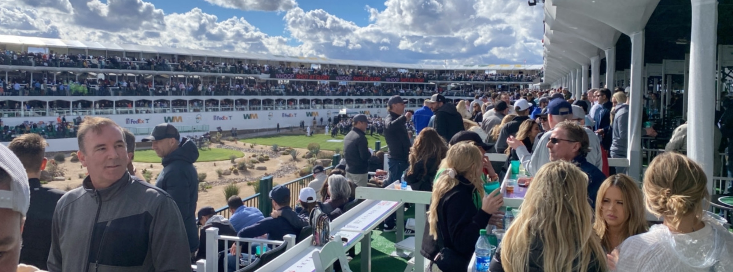 Action in the Skybox 16 on hole 16 at the Waste Management Open